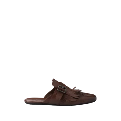 Shuffle Antiqued Leather Mules With Buckled Strap And Fringe